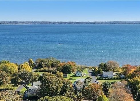 Property abuts last house on the left. Large tree on the property has been removed